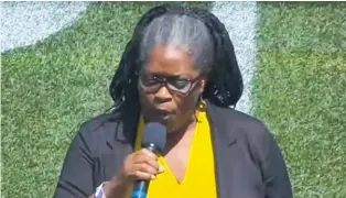  ??  ?? Crystal Collins “sings” the national anthem God Defend New Zealand before the Kiwis match in Denver last weekend.