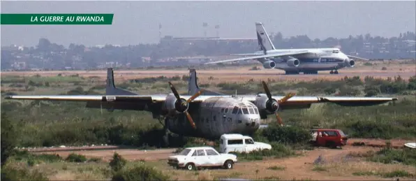  ?? LARRY MILBERRY ?? En août 1994, alors qu’arrivent les gros-porteurs du pont aérien humanitair­e sur Kigali, le deuxième Noratlas (le n° 177 9XR-GX) gît toujours à l’état d’épave au bord de la piste. Il y restera jusqu’en 2010.