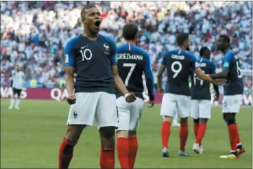  ?? DAVID VINCENT — THE ASSOCIATED PRESS ?? France’s Kylian Mbappe celebrates after scoring his side’s third goal against Argentina on June 30 in Kazan, Russia.