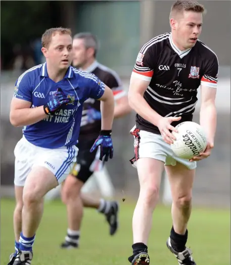  ??  ?? Lyre’s Brian O’Keeffe about to lay off the ball against Kilbrin in the Kanturk Credit Union JAFC in Kanturk.
Photo by John Tarrant