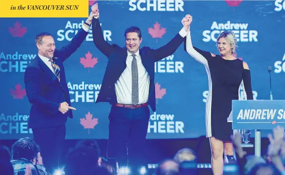  ?? ANDREW VAUGHAN / THE CANADIAN PRESS ?? Former cabinet minister Peter MacKay, left, introduces party leader Andrew Scheer and his wife Jill at the Conservati­ve party’s national policy convention in Halifax on Friday.
