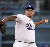  ?? MARK J. TERRILL – THE ASSOCIATED PRESS ?? Dodgers starting pitcher Julio Urias held the Twins to one run and five hits over seven innings, striking out eight.