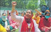  ?? WASEEM ANDRABI/HT ?? Members of KP community during a protest against the killing of Rajni Bala (right), in Srinagar on Tuesday. It’s a second targeted killing of a Hindu govt employee in less than a month.