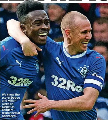  ??  ?? We know the score: Dodoo and Miller were on target as Rangers triumphed at Aberdeen