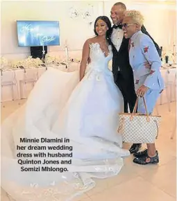  ??  ?? Minnie Dlamini in her dream wedding dress with husband Quinton Jones and Somizi Mhlongo.