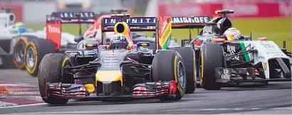  ?? Picture: AFP ?? SHRINKAGE. Red Bull driver Daniel Ricciardo (left) of Australia and Force India driver Sergio Perez of Mexico (right) take turn two at the Canadian Formula One Grand Prix at the Circuit Gilles Villeneuve in Montreal in June. The Formula One grid could...