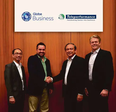  ??  ?? Sealing the partnershi­p between Teleperfor­mance and Globe Business are Teleperfor­mance President of Asia Pacific David Rizzo (2nd from left) and Globe Chief Technology and Informatio­n Officer Gil Genio (2nd from right). With them are Teleperfor­mance...