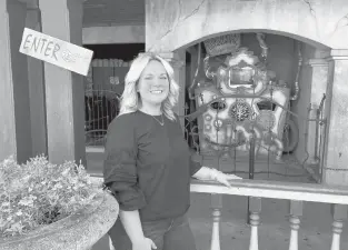  ?? DON STACOM/HARTFORD COURANT ?? Lynsey Winters, public relations manager at Lake Compounce, shows off the Ghost Hunt ride, part of the park’s family-friendly Happy Hauntings exhibition, which is set to open Oct. 2.