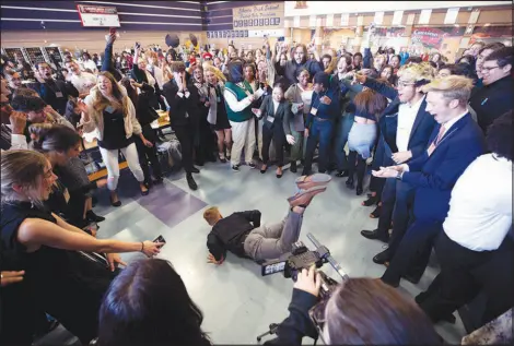  ?? ?? A student shows off his dance moves during an entertainm­ent break at the Sun Youth Forum.