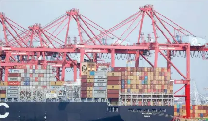  ?? — Reuters ?? A container ship is shown at port in Long Beach, California, US.