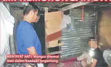  ??  ?? MENYAYAT HATI: Mangsa ditemui mati dalam keadaan tergantung.