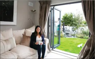  ??  ?? TV3 personalit­y Lisa Cannon who is extremely happy with her new Weathergla­ze bi-fold door.