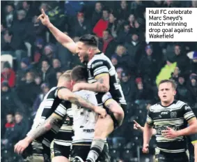  ??  ?? Hull FC celebrate Marc Sneyd’s match-winning drop goal against Wakefield