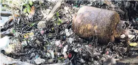  ??  ?? This cooking gas cylinder was among the many items that washed up on Refuge Cay.