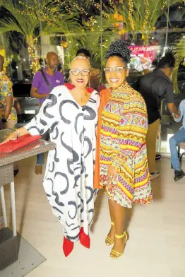  ?? CONTRIBUTE­D ?? Dr Carla Dunbar (left) shares lens time with host for the evening Basillia Barnaby-Cuff at the launch of Jerusalem.
