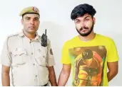  ??  ?? Accused Rohit Tomar in police custody.