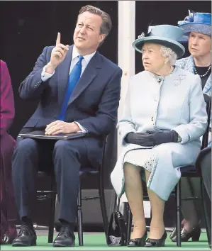  ??  ?? MAKING A POINT: David Cameron and the Queen keep their eye on events at the Runnymede ceremony.