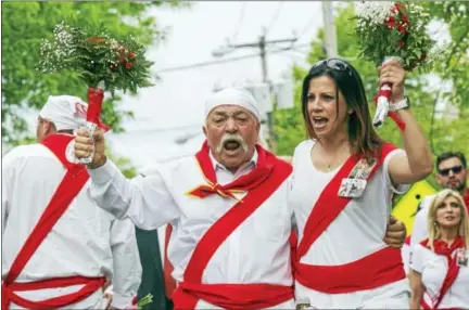  ?? SANDY ALDIERI — SPECIAL TO THE PRESS ?? Domenic Giuliano and his daughter Santina Giuliano of Middletown took part in the St. Sebastian I Nuri run earlier this month on Washington Street. The devoted Catholics make the pilgrimage — either from the cemetery on the Middlefiel­d line or the...