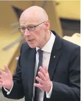  ??  ?? Under fire John Swinney announced the change of direction in Parliament last week