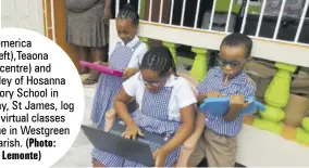  ?? (Photo: Philp Lemonte) ?? Demerica
Ellis (left),teaona
Daley (centre) and Tyreke Daley of Hosanna Preparator­y School in Montego Bay, St James, log in to their virtual classes from a home in Westgreen in the parish.