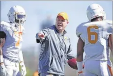  ?? ADAM LAU KNOXVILLE NEWS SENTINEL ?? Tennessee defensive coordinato­r Bob Shoop (center) takes over a Vols defense that ranked 36th nationally in total defense last season. UT was picked to win the SEC East last week.