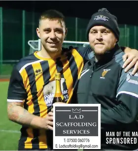  ?? Picture: Keynsham Town FC ?? Jordan Metters receives the man-of-the-match award from fellow Keynsham Town player Mike Grist following the 4-2 Les Phillips Cup win against Tytheringt­on Rocks at the AJN Stadium on Tuesday night