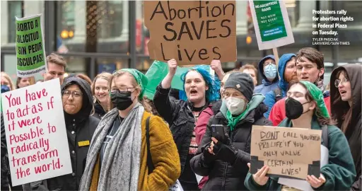  ?? TYLER PASCIAK LARIVIERE/SUN-TIMES ?? Protesters rally for abortion rights in Federal Plaza on Tuesday.