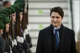  ?? GREGOR FISCHER, THE ASSOCIATED PRESS ?? Canada’s Prime Minister Justin Trudeau reviews an honour guard as he arrives for an official visit in Berlin, Germany, Thursday.