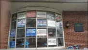  ?? SUBMITTED PHOTO ?? Damage from bullets fired into the front window of the Montgomery County Democratic Committee is marked by blue tape.