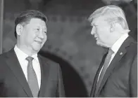  ??  ?? XI (kiri) dan Trump. — Gambar Reuters