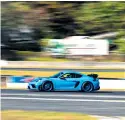  ?? ?? A Porsche Cayman GT4 RS at speed