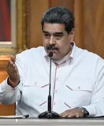  ?? — AFP photos ?? Venezuelan President Nicolas Maduro speaks during a press conference at Miraflores Presidenti­al Palace in Caracas.