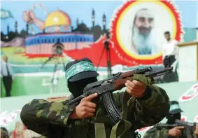  ?? SHOWING OFF his ‘Am Yisrael chai’ tattoo. (Abid Katib/Getty Images) ?? ‘IF YOU live your life just denying everything... of course you’re going to support what Hamas does and call them “freedom fighters.”’