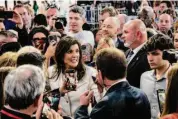  ?? Haiyun Jiang/New York Times ?? Nikki Haley, former Republican governor of South Carolina, greets supporters after announcing her bid for the Republican presidenti­al nomination.