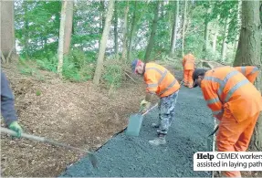  ??  ?? Help CEMEX workers assisted in laying paths