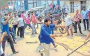  ?? PTI FILE ?? Members of two political parties clash in West Bengal. Opposition parties have accused TMC of using violence to deter its leaders from submitting their nomination­s for the panchayat polls