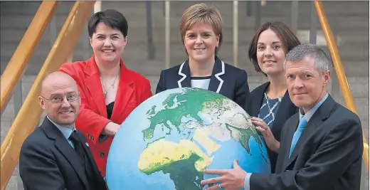  ??  ?? GLOBAL MOVE: The leaders of Scotland’s political parties came together to show their backing for positive action on Climate Change. Patrick Harvie, of the Green Party, Ruth Davidson, from the Conservati­ves, Labour’s Kezia Dugdale, and Willie Rennie, of...