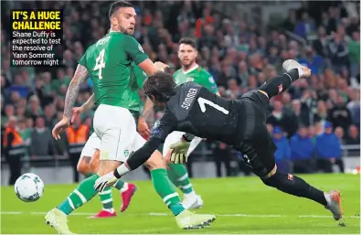  ??  ?? IT’S A HUGE CHALLENGE Shane Duffy is expected to test the resolve of Yann Sommer tomorrow night