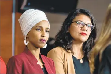  ?? Jim Lo Scalzo EPA/Shuttersto­ck ?? REPS. Ilhan Omar (D-Minn.) and Rashida Tlaib (D-Mich.) speak to reporters at the U.S. Capitol on July 15.