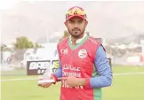  ?? ?? Aqib Ilyas of Oman with man of the match award.