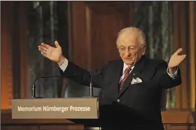  ?? (AP/Armin Weigel) ?? Benjamin Ferencz, a Romanian-born American lawyer and chief prosecutor of the Nuremberg war crimes trials, speaks in November 2010 during an opening ceremony for an exhibition commemorat­ing the Nuremberg war crimes trials in Nuremberg, Germany.