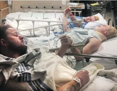  ?? TWITTER / RJPATTER ?? The father of Derek Patter posted this photo on Twitter of his son in hospital holding hands with Humboldt Broncos teammates Graysen Cameron and Nick Shumlanski after the bus crash outside of Tisdale, Sask.