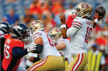  ?? JUSTIN EDMONDS – GETTY IMAGES ?? Jimmy Garoppolo, right, made three starts for the 49ers in 2018, tearing an ACL in Week 3and being lost for the season.