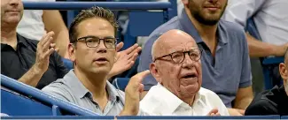  ?? ?? Murdoch and his son and heir Lachlan at the 2018 US Open tennis tournament in New York.