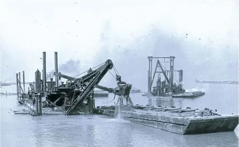  ?? ST. CATHARINES MUSEUM, BARBARA HOWARD COLLECTION ?? Dredgework underway on the Welland Ship Canal in Port Weller.