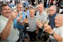  ??  ?? John Knowles, centre, celebrates with other key contributo­rs to the Save the Turbos campaign when it was confirmed the team would not be demoted.