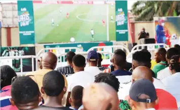  ?? ?? Fans at the Surulere viewing centre to watch the Super Eagles game at the ongoing AFCON in Cameroun