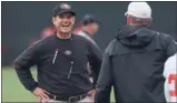  ?? JIM GENSHEIMER/ STAFF ?? Jim Harbaugh is happy to be back at work one day after undergoing a minor heart procedure.