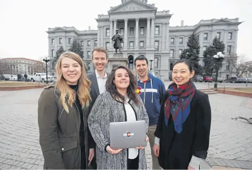  ??  ?? From left, Stephanie Cain, Matthew McAllister, Janell Schafer, Kelly Taylor and Yeri Kim are members of the Colorado Digital Service. They posed outside the state Capitol in downtown Denver in January. Gov. Jared Polis created the Colorado Digital Service.