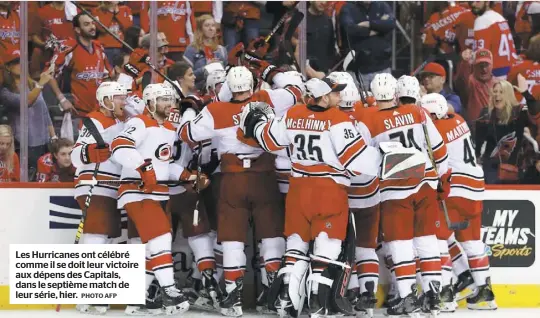  ?? PHOTO AFP ?? Les Hurricanes ont célébré comme il se doit leur victoire aux dépens des Capitals, dans le septième match de leur série, hier.